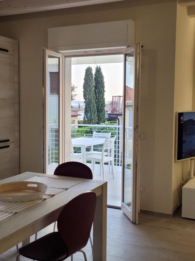 Garda View - Nuovo Appartamento Con Solarium Vista Lago Dış mekan fotoğraf